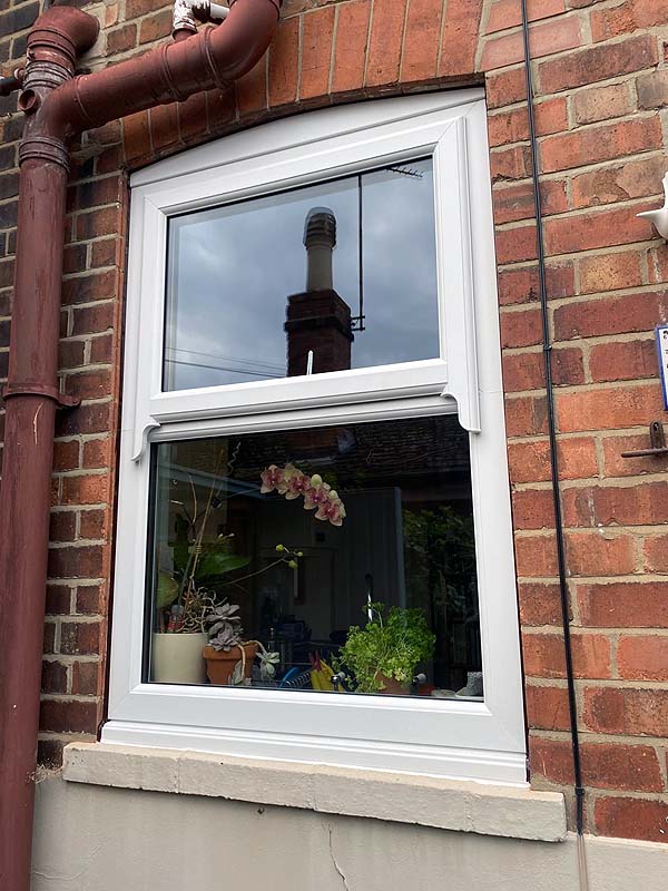UPVC window with mock sash horns