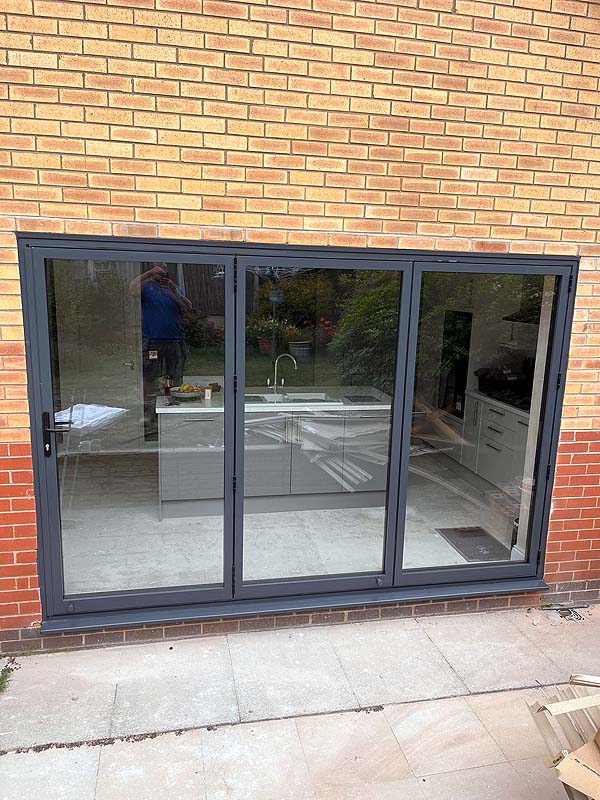 Anthracite grey aluminium bi folding door
